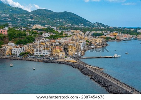 Seaside view of Porto d'Ischia town from the Aragonese castle at Ischia island, Italy.