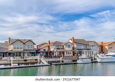 Seaside Views At A Harbour In Huntington Beach California With Waterfront Homes