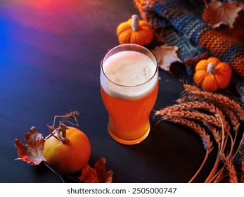 Seasonal pumpkin ale beer for Thanksgiving. Craft beer. Orange pumpkin, wheat ears and autumn leaves. Copy space - Powered by Shutterstock