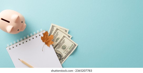 Seasonal rise in costs and bills theme. Top view shot of piggy bank, cash, notepad, pen, maple leaf on soft blue backdrop with blank space for text or ads - Shutterstock ID 2365207783