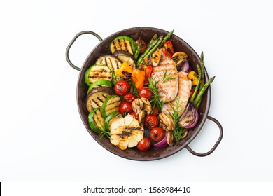 Seasonal, Summer Eating Concept. Grilled Vegetables And Chicken Breast In A Pan On A White Table, Isolated. Top View Flat Lay Background