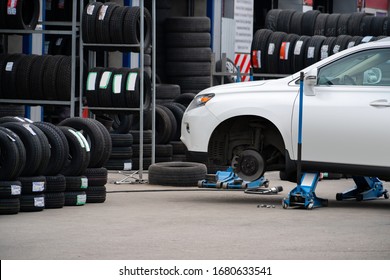 Seasonal Tire Change At A Tire Shop Service