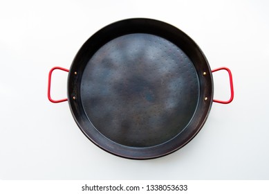 Seasoned Carbon Steel Paella Pan Isolated On White Background, Top View