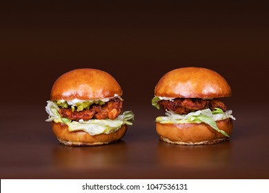 Seasoned Grilled Hamburger Sliders On Brown Background