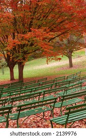 Seasongood Pavilion Benches	 - The Green Benches At Seasongood Pavilion Are Empty As They Sit Under The Colorful Canopy Of Orange Foliage  In Autumn. Eden Park, Cincinnati Ohio, USA