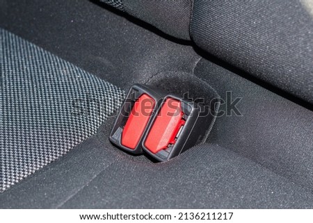 Seat belt buckle in the car.