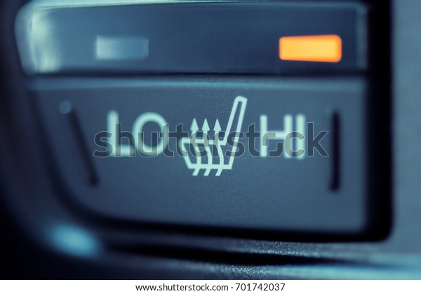 Seat heating icon in a\
modern car