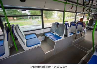 Seat Places In Back Side Of Modern City Bus. Wide Angle Shot