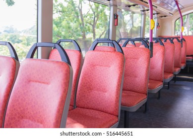 Seat Places In Back Side Of Modern Bus Or Transport Tourism, Road Trip And Equipment Concept - Travel Bus Interior And Seats