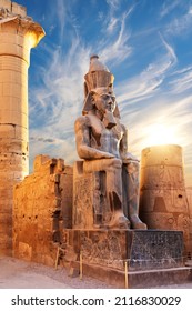 Seated statue of Ramesses II by the Luxor Temple entrance, Egypt - Shutterstock ID 2116830029