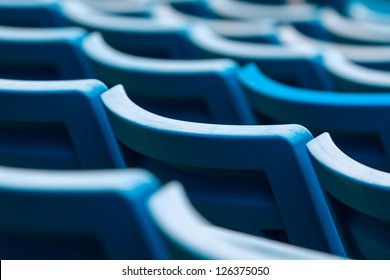 Seating Rows In A Stadium With Weathered Chairs