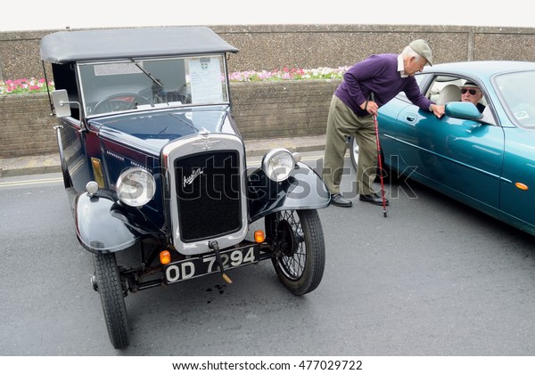 SEATON, UNITED KINGDON-AUGUST 28, 2016: The annual\
Classic Car Show at the start of Carnival week in Seaton, Devon.\
Nearly 100 classic cars fill the Esplanade from Fishermans Gap to\
Beach Road.