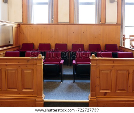 Seats of the jury box in a courtroom 