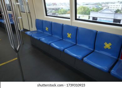 Seats Of Train,public Transportation Put Yellow Cross Symbol,signage To Remind People Not Sitting For Social Distancing To Help Stop Spreading  Covid-19 For Public Health Safety. Concept New Normal.