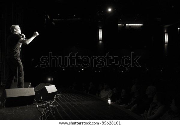 SEATTLE - APRIL\
6: Controversial, singer, actor, poet and spoken word artist Henry\
Rollins performs on stage at the Triple Door Theater in Seattle,\
Washington on April 6,\
2011.