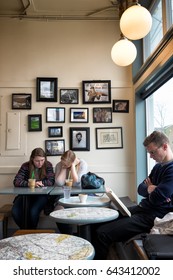 SEATTLE - April 8, 2017: Casual Neighborhood Cafe Catering To Local Residents Of The Ballard Neighborhood. Customers Drink Coffee, Talk, Read. Decorated With Family Memorabilia.