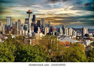 Seattle City Skyline Taken From Kerry Park In Spring Time With Light Sunset And Mount Rainier In Background