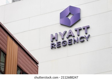 Seattle - January 23, 2022; Sign For Hyatt Regency Hotel In Seattle In Ourple With Logo