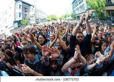 SEATTLE - JULY 22:  Thousands Of Fans Cheer For The Lumineers During The Capitol Hill Block Party In Seattle On July 22, 2012