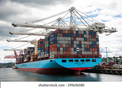 SEATTLE - MAY 10: A Maersk Line freighter is docked on Harbor Island in Seattle, Washington on May 10, 2014.