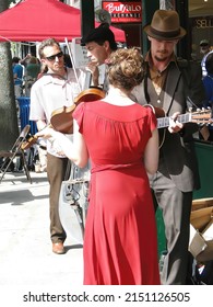 SEATTLE - MAY 15, 2010 -  Female Violinist Plays With Her Band  At The U District Street Fair In Seattle Washington