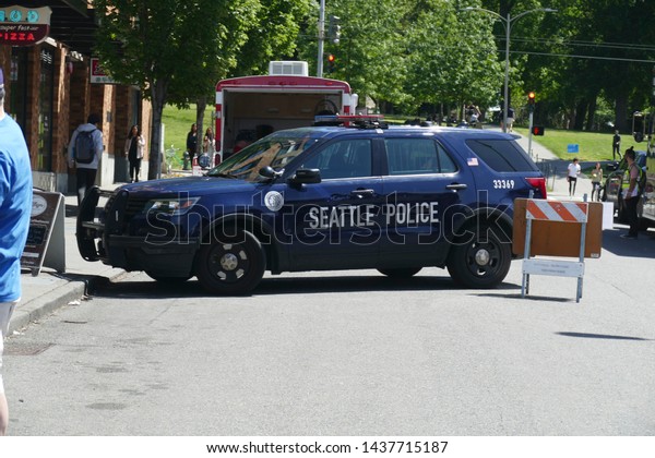 SEATTLE - MAY 18, 2019 - Police cars parked at
 the 50th Annual University District Street Fair (oldest in the
country),Seattle,
Washington