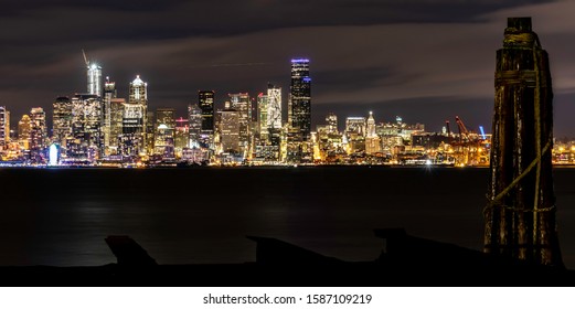 Seattle Night Skyline With Ferris Wheel From West Seattle With Old Dock And Pileinga 