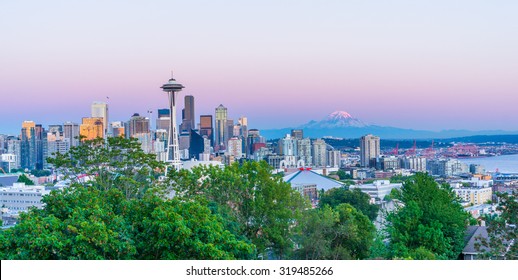 Seattle skyline with Mount Rainier in the background during sunset. - Powered by Shutterstock