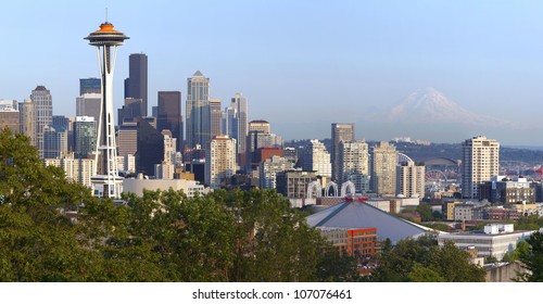 Seattle Skyline At Sunset And Mt. Rainier.