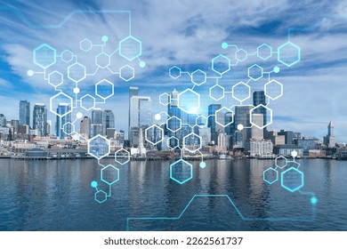 Seattle skyline with waterfront view. Skyscrapers of financial downtown at day time, Washington, USA. Decentralized economy. Blockchain, cryptography and cryptocurrency concept, hologram - Shutterstock ID 2262561737