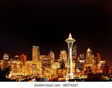 Seattle Space Needle In Golden Glow At Night