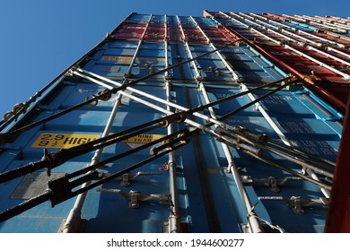 Seattle, United States - 12 13 2020: Stack Of  Different Colors Containers Secured On The Ship And Lashes With Lashing Bars, Turnbuckles And Twist Locks. 