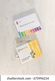 SEATTLE, USA - July 12, 2017: New Telomere Age Test Kit For Cellular Age From Telomere Diagnostics Inc., And Saliva Collection Kit From 23andMe DNA For Ancestry And Health Test.