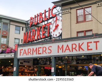 Seattle USA - July 20 2008; Pyke Place Famous Farmers Market And Tourist Attraction Providing Artisan And Specialty Food And Produce.with Landmark Clock At 8.00