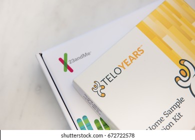 SEATTLE, USA - July 6, 2017: New Telomere Age Test Kit For Cellular Age From Telomere Diagnostics Inc., And Saliva Collection Kit From 23andMe DNA For Ancestry And Health Test.