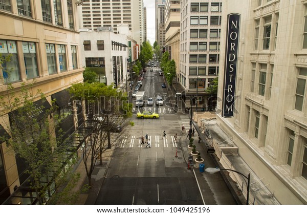 SEATTLE, USA - MAY 06, 2015: People and cars in\
and around the city of\
Seattle.