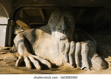 Seattle, USA. The November 2019. Troll Sculpture Under Fremont Bridge In The City