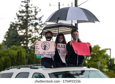 Seattle, WA -12 June 2020 Silent March at Jefferson Park, downtown. Black Lives Matter. People on streets with posters and signs. Solidarity march.