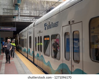 Seattle, WA AUGUST 26, 2018: Passengers Set To Board The Sound Transit Link Light Rail Train