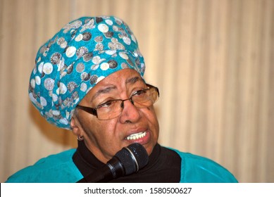 SEATTLE, WA. JANUARY 11, 2014. CIRCA: African American Woman Giving A Presentation On Diversity To A Group Of People.