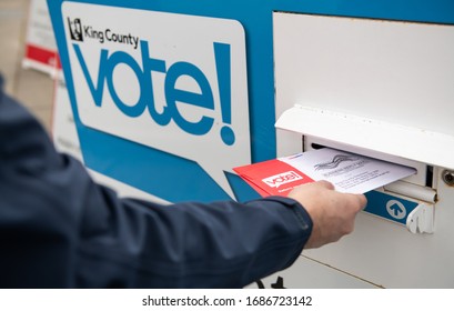 Seattle, WA - March 10, 2020: Washington State's Mail in Ballots for Presidential Primary Elections Being Dropped off at Designated Collection Box