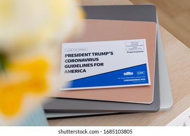 Seattle, WA - March 26, 2020: Post Card Sent Out To Residents Of United States From White House And CDC With Guidelines About Coronavirus Pandemic. Link To Official Website.