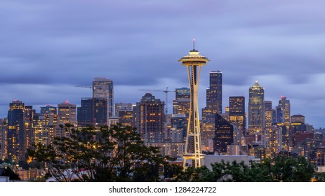 SEATTLE, WA - SUMMER 2015 - A Close Up Shot Of Tge Seattle Skyline And Iconic Space Needle During A Cloudy Twilight Long Exposure 