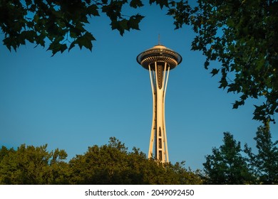 Seattle, WA, US - July 5, 2021: View Of The Iconic Seattle Space Needle Isolated At Golden Hour Against Bright Blue Sky.