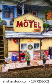 Seattle, WA. USA - 12-17-2020: Christmas Yard Decoration Done In The Style Of Rosebud Motel From The TV Show Schitts Creek