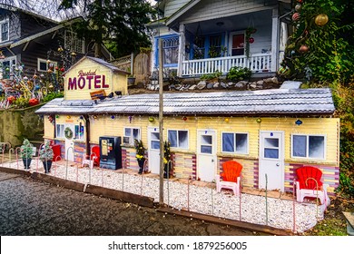 Seattle, WA. USA - 12-17-2020: Christmas Yard Decoration Done In The Style Of Rosebud Motel From The TV Show Schitts Creek