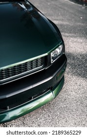 Seattle, WA, USA
August 11, 2022
Green Ford Mustang Showing The Grille Of The Car