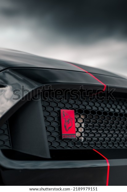Seattle, WA, USA\
August 13,\
2022\
Black Ford Mustang S550 showing the Coyote badge on the\
grille