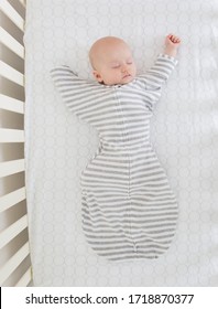 Seattle, WA / USA - Circa 2019: Safe Sleep Environment For Baby In Transitional Swaddle Sack By SwaddleDesigns, Cotton Stripes 1