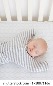 Seattle, WA / USA - Circa 2019: Safe Sleep Environment For Baby In Transitional Swaddle Sack By SwaddleDesigns, Cotton Stripes 2